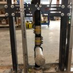 Copper riser piping installed between floors in a commercial building under construction