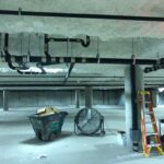 Pipe rough-in above a commercial ceiling before insulation is closed up